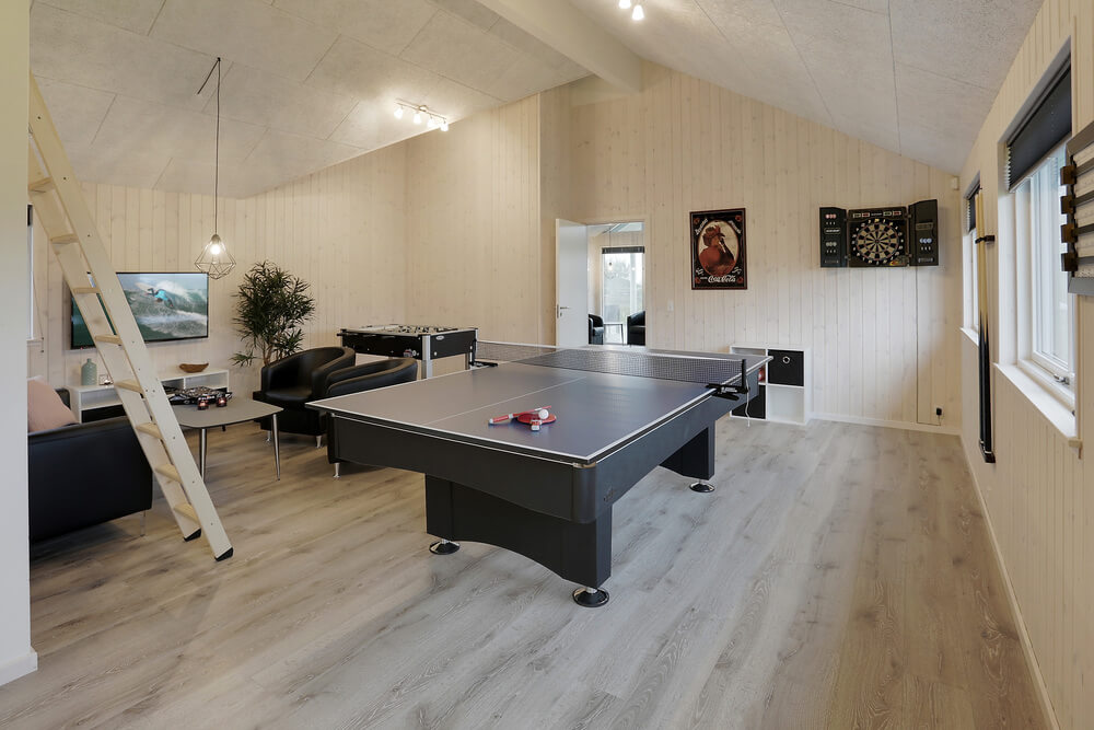 Neben den vielen schönen Stunden, die man im Poolbereich des Hauses verbringen kann, bietet das Luxusferienhaus 392 auch Spielevergnügen bei Billard/Tischtennis und Darts
