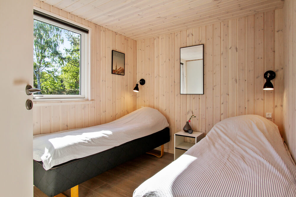 Eines der 8 Schlafzimmer im Luxusferienhaus Nr. 410