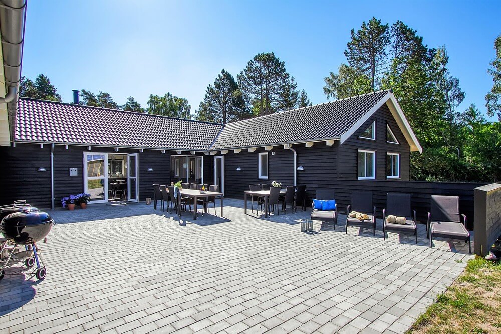 Genießen Sie einen Grillabend auf der Terrasse des Luxusferienhauses Nr. 410 in Nordseeland
