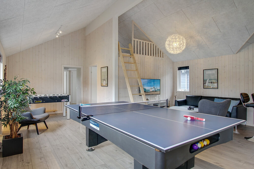 Aktivitätsraum im Luxusferienhaus Nr. 409 mit 7 Schlafzimmern und Platz für 18 Gäste.