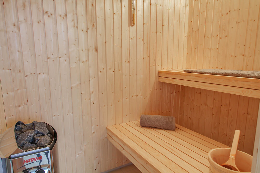 Genießen Sie die heiße Sauna im Luxusferienhaus Nr. 409 für 18 Personen