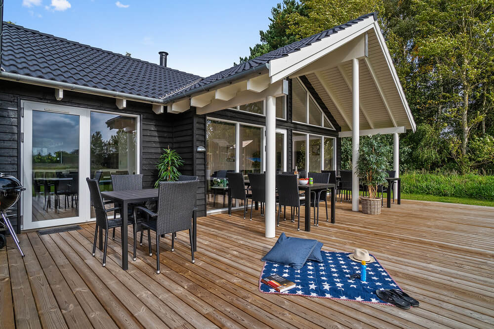 Genießen Sie einen Grillabend auf der Terrasse des Luxusferienhauses Nr. 416 in Nordseeland