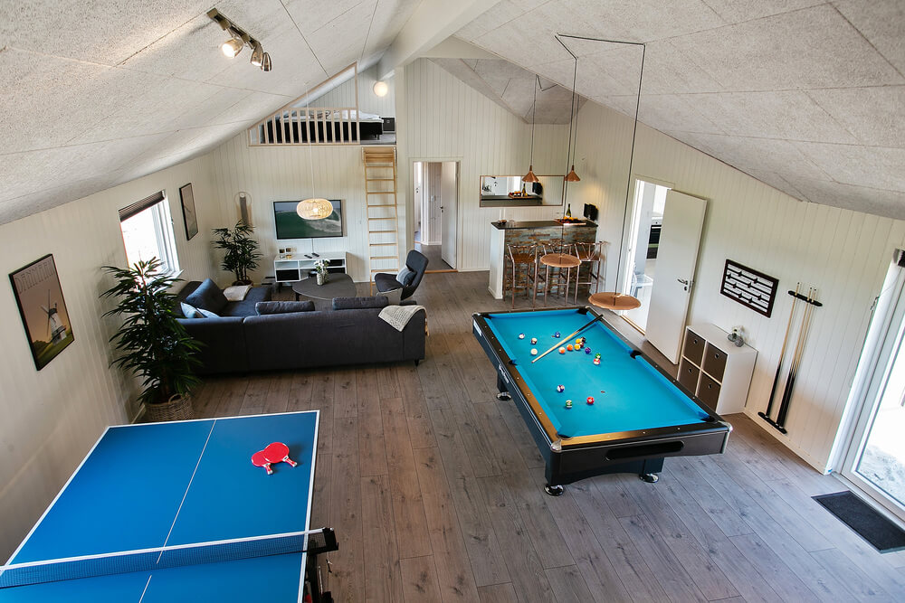Neben den vielen schönen Stunden, die man im Poolbereich des Hauses verbringen kann, bietet das Luxusferienhaus 403 auch Spielevergnügen bei Billard/Tischtennis und Darts