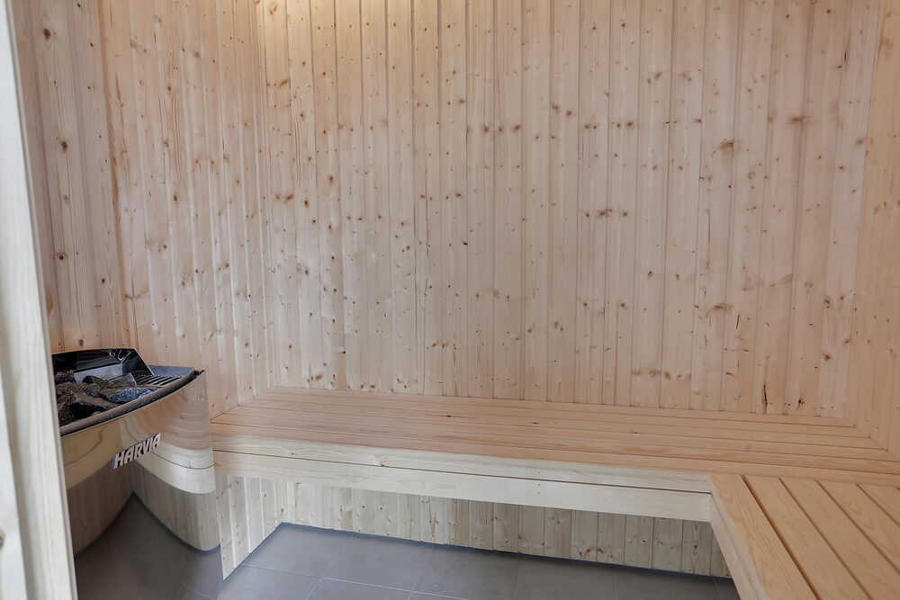 Genießen Sie die heiße Sauna im Luxusferienhaus Nr. 403 für 24 Personen