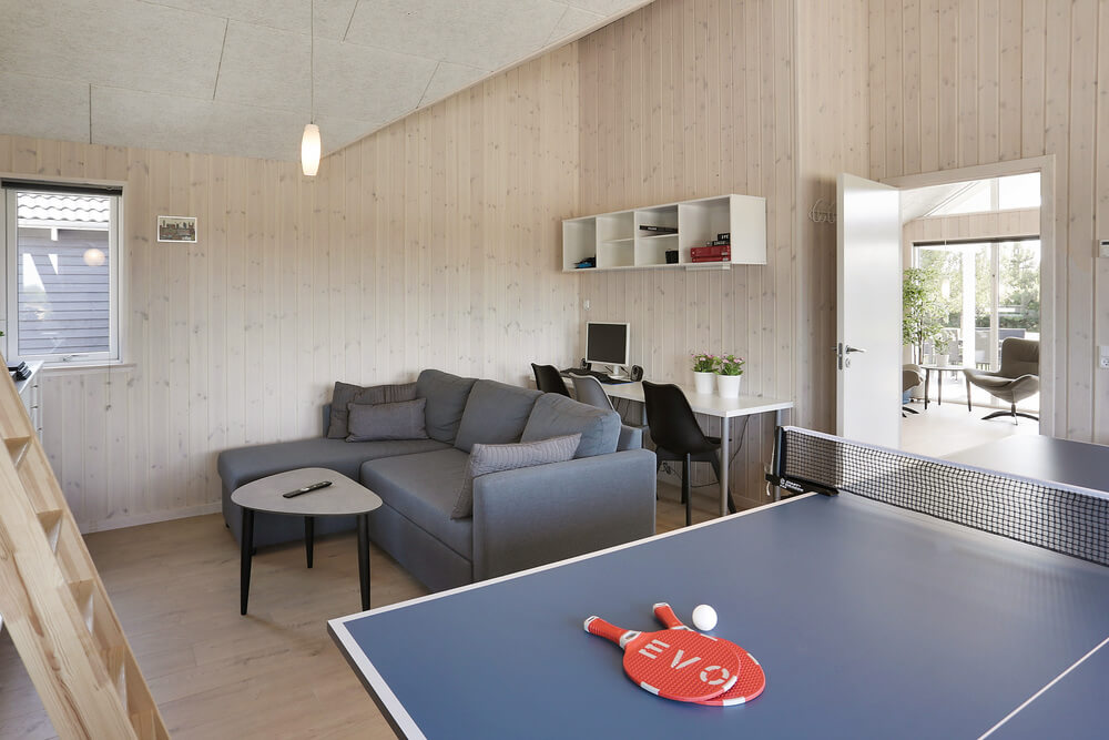 Das Luxusferienhaus 413 für 20 Personen hat einen großen Aktivitätsraum mit u. a. Billard und Darts