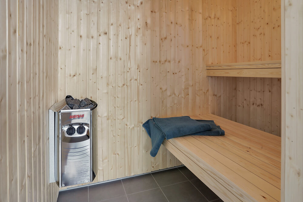 Genießen Sie die heiße Sauna im Luxusferienhaus Nr. 413 für 20 Personen