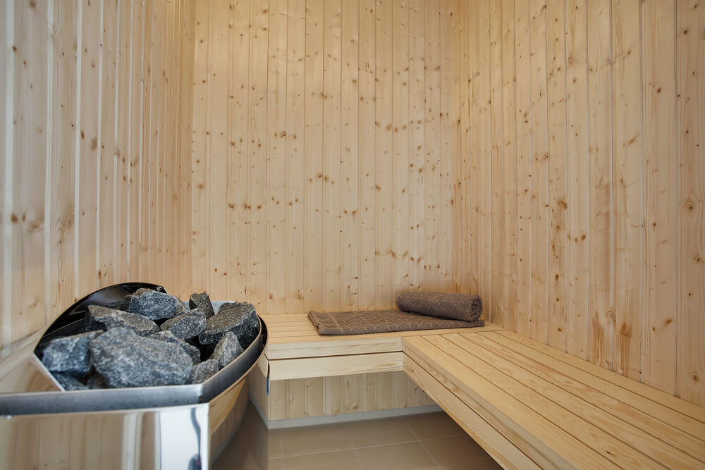 Genießen Sie die heiße Sauna im Luxusferienhaus Nr. 418 für 14 Personen