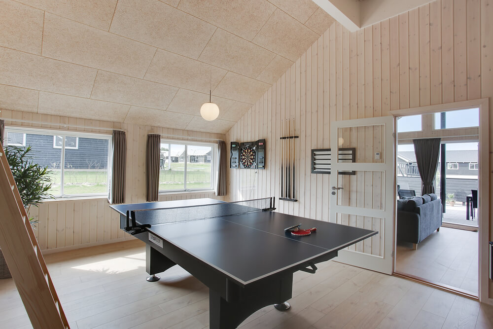 Das Luxusferienhaus 418 für 14 Personen hat einen großen Aktivitätsraum mit u. a. Billard und Darts