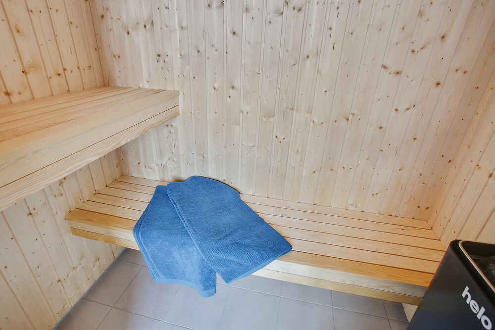 Genießen Sie die heiße Sauna im Luxusferienhaus Nr. 411 für 14 Personen