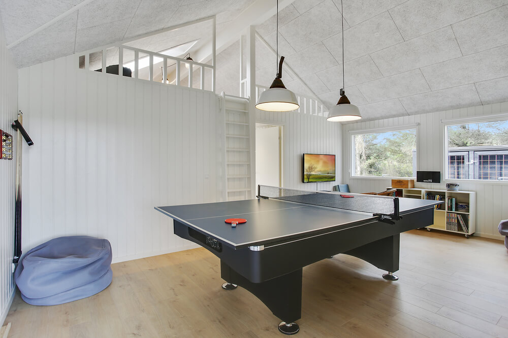 Neben den vielen schönen Stunden, die man im Poolbereich des Hauses verbringen kann, bietet das Luxusferienhaus 411 auch Spielevergnügen bei Billard/Tischtennis und Darts