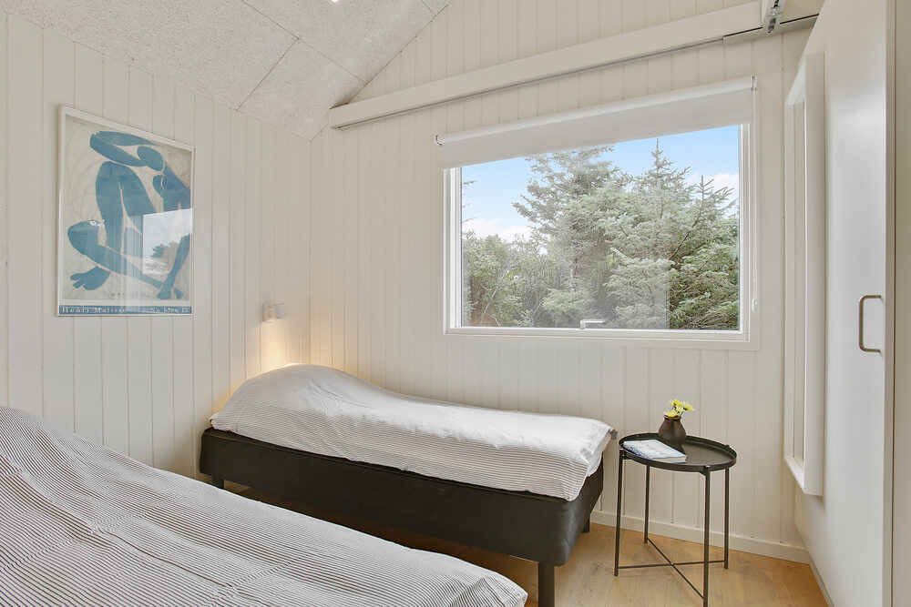 Eines der 5 Schlafzimmer im Luxusferienhaus Nr. 411