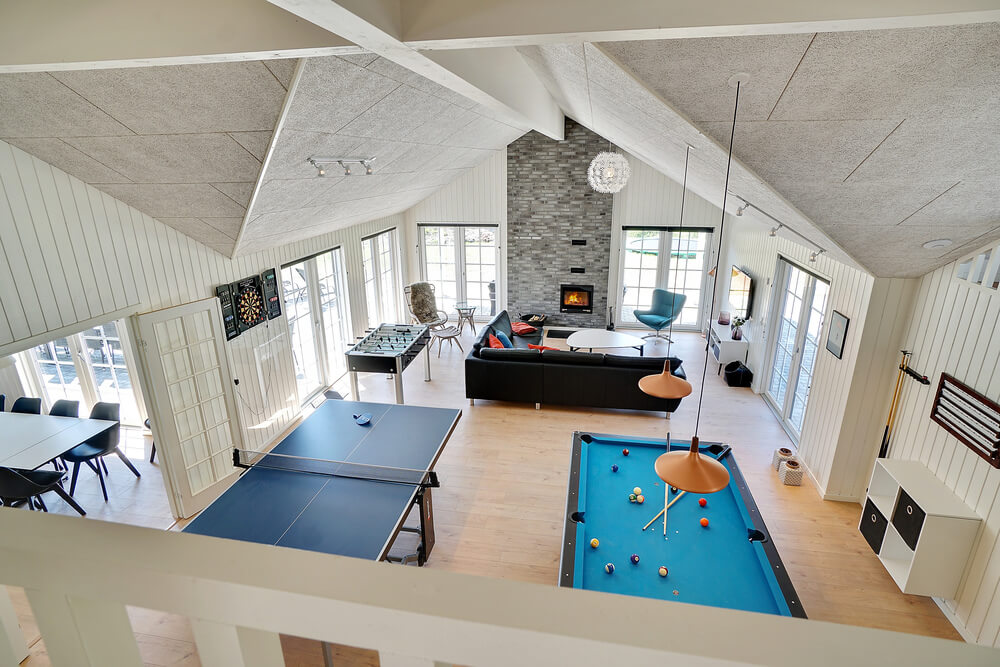 Das Luxusferienhaus 412 für 24 Personen hat einen großen Aktivitätsraum mit u. a. Billard und Darts