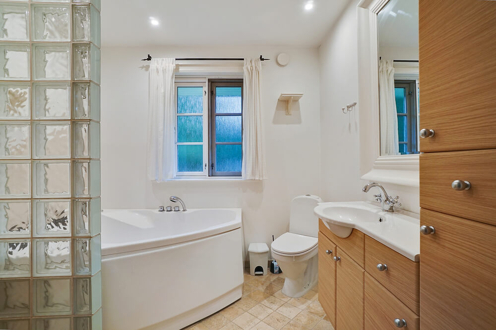 Genießen Sie den warmen Whirlpool im Luxusferienhaus Nr. 414 in Nordseeland