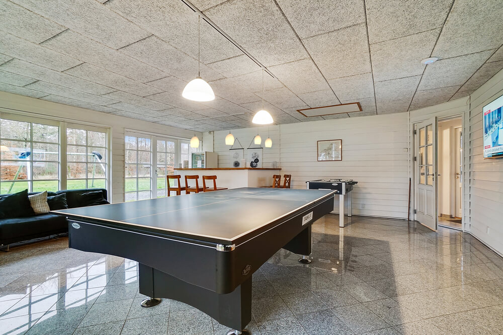 Neben den vielen schönen Stunden, die man im Poolbereich des Hauses verbringen kann, bietet das Luxusferienhaus 414 auch Spielevergnügen bei Billard/Tischtennis und Darts