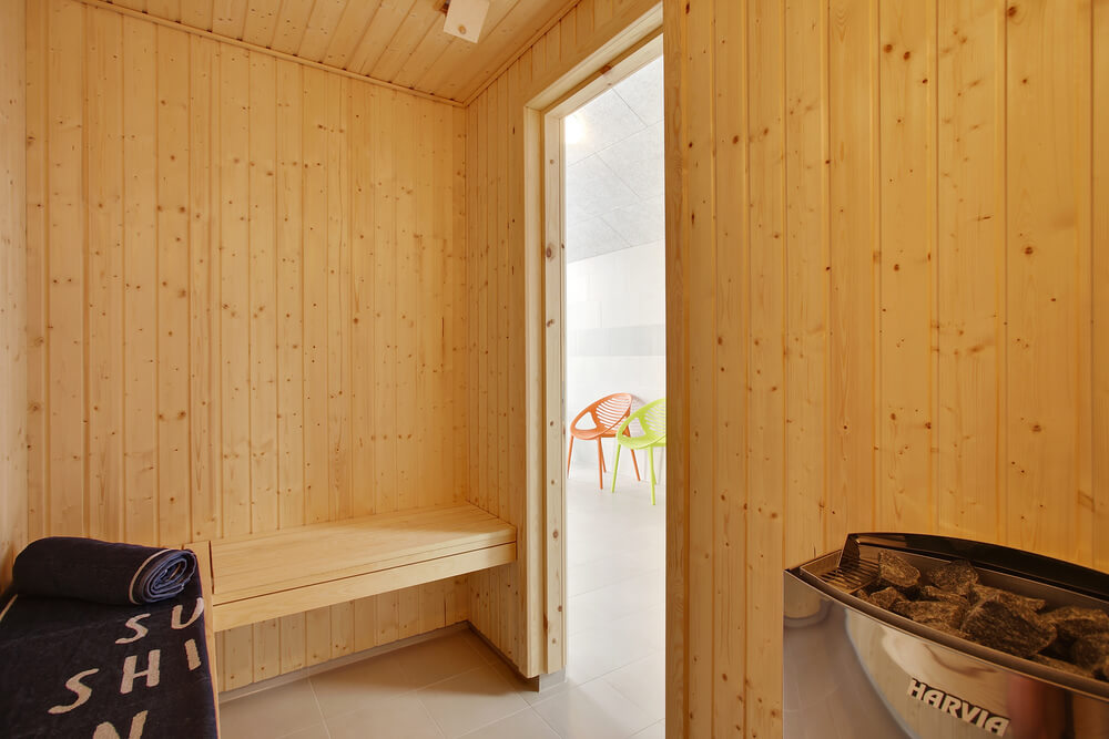 Genießen Sie die heiße Sauna im Luxusferienhaus Nr. 430 für 30 Personen