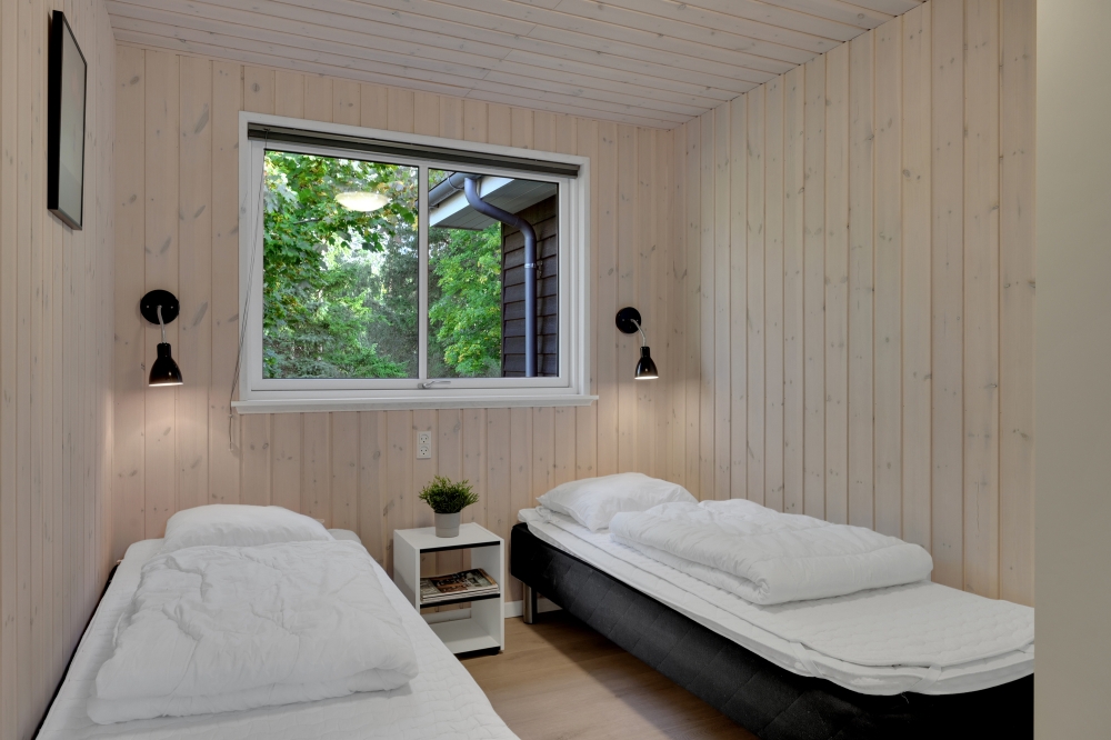 Eines der 12 Schlafzimmer im Luxusferienhaus Nr. 438