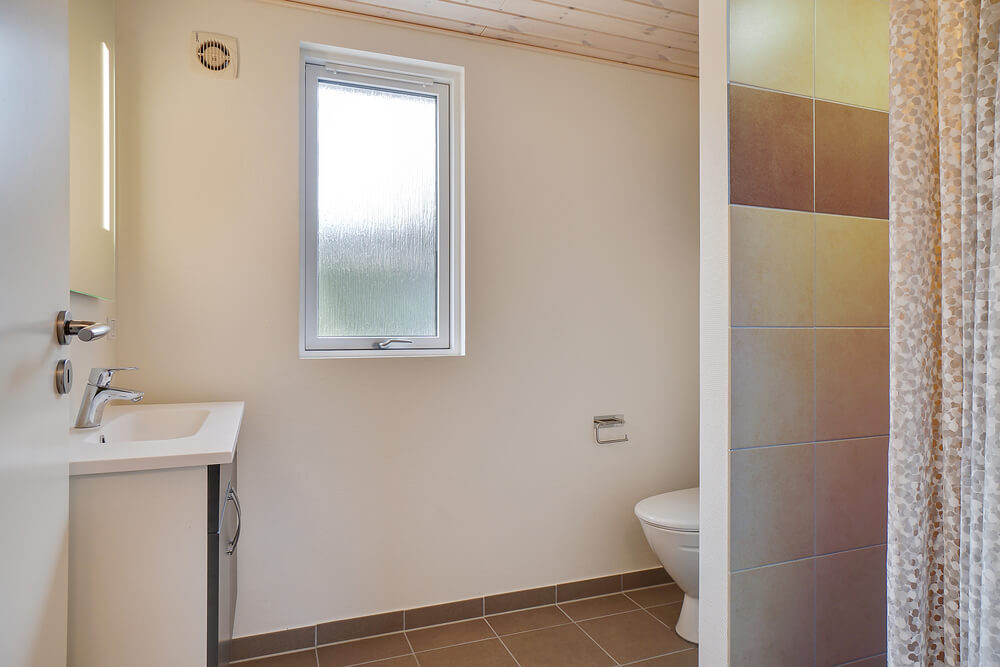 Eines der Badezimmer im Luxusferienhaus Nr. 429