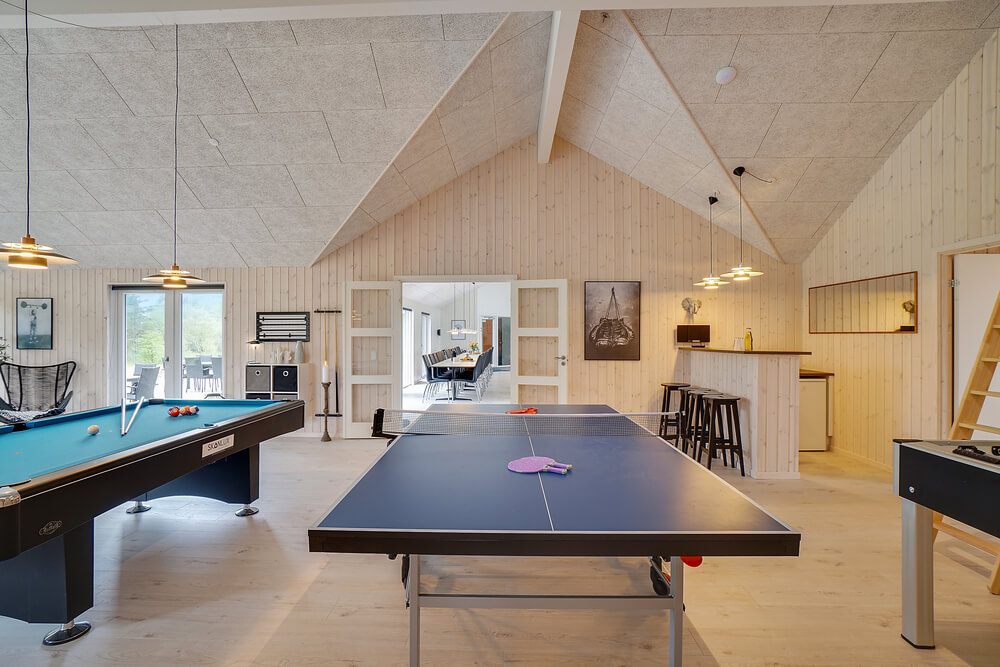 Neben den vielen schönen Stunden, die man im Poolbereich des Hauses verbringen kann, bietet das Luxusferienhaus 429 auch Spielevergnügen bei Billard/Tischtennis und Darts