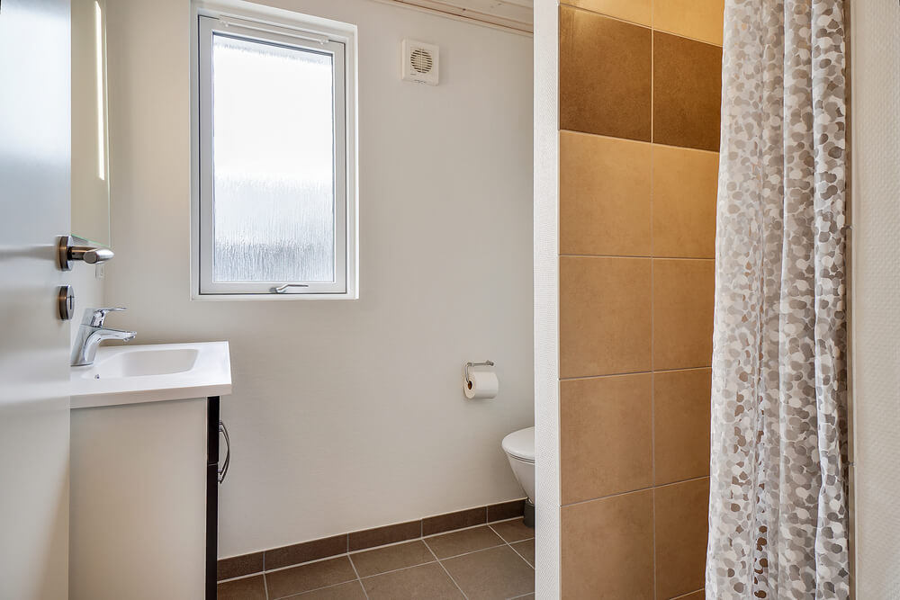 Eines der Badezimmer im Luxusferienhaus Nr. 431