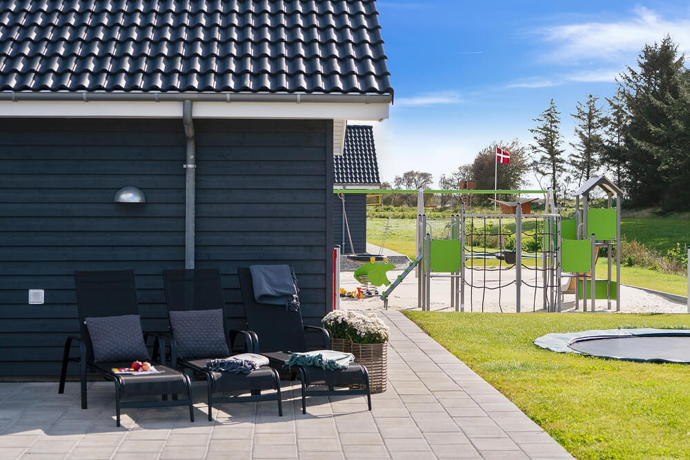 Genießen Sie einen Grillabend auf der Terrasse des Luxusferienhauses Nr. 431 in Limfjord