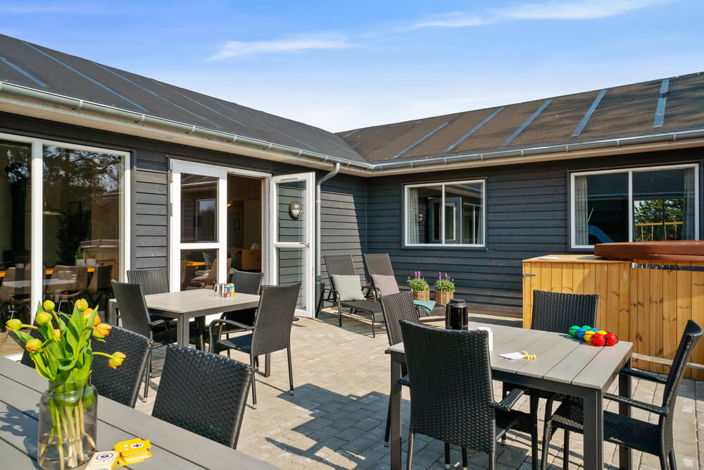Genießen Sie einen Grillabend auf der Terrasse des Luxusferienhauses Nr. 440 in Nordjütland