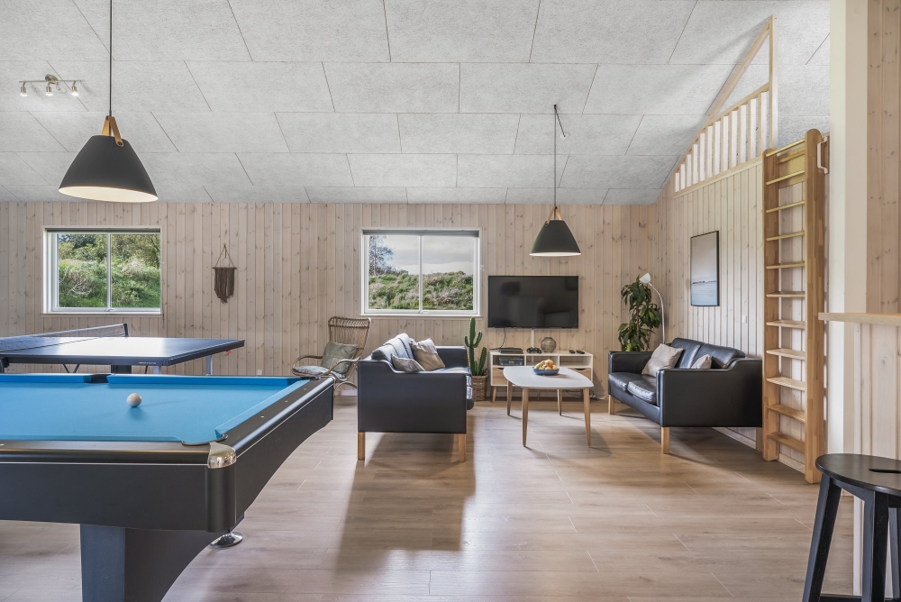 Neben den vielen schönen Stunden, die man im Poolbereich des Hauses verbringen kann, bietet das Luxusferienhaus 440 auch Spielevergnügen bei Billard/Tischtennis und Darts