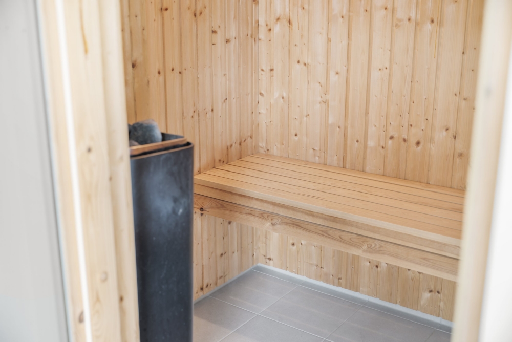 Genießen Sie die heiße Sauna im Luxusferienhaus Nr. 440 für 24 Personen