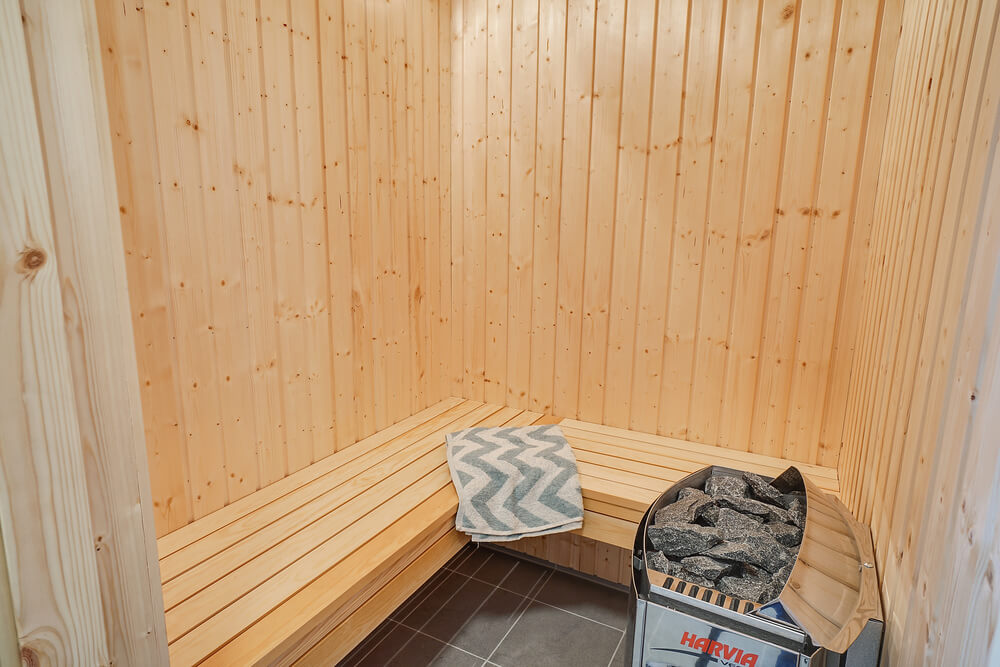Genießen Sie die heiße Sauna im Luxusferienhaus Nr. 724 für 10 Personen
