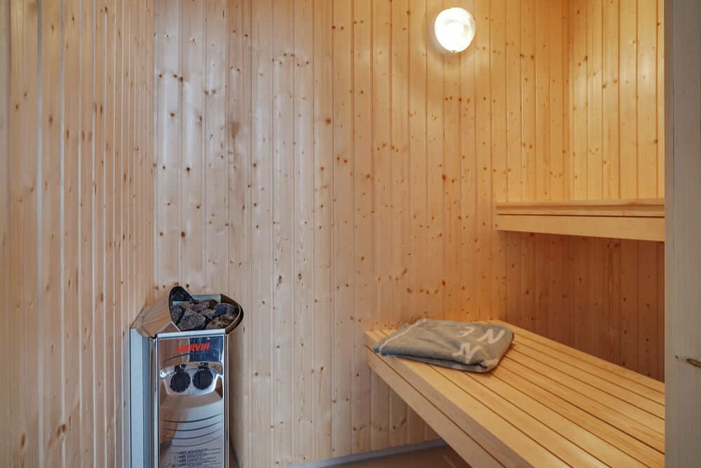 Genießen Sie die heiße Sauna im Luxusferienhaus Nr. 721 für 18 Personen