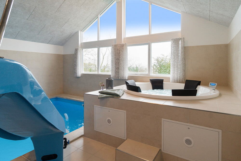 Genießen Sie den warmen Whirlpool im Luxusferienhaus Nr. 721 in Deutschland