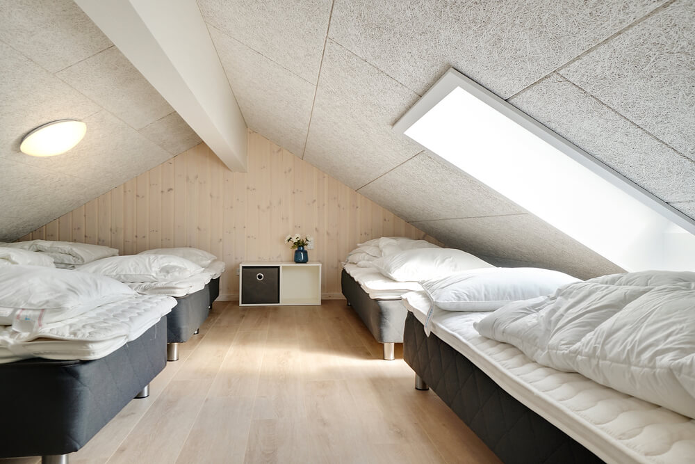Der große ausgebaute Dachboden im Luxusferienhaus Nr. 442 für 26 Personen