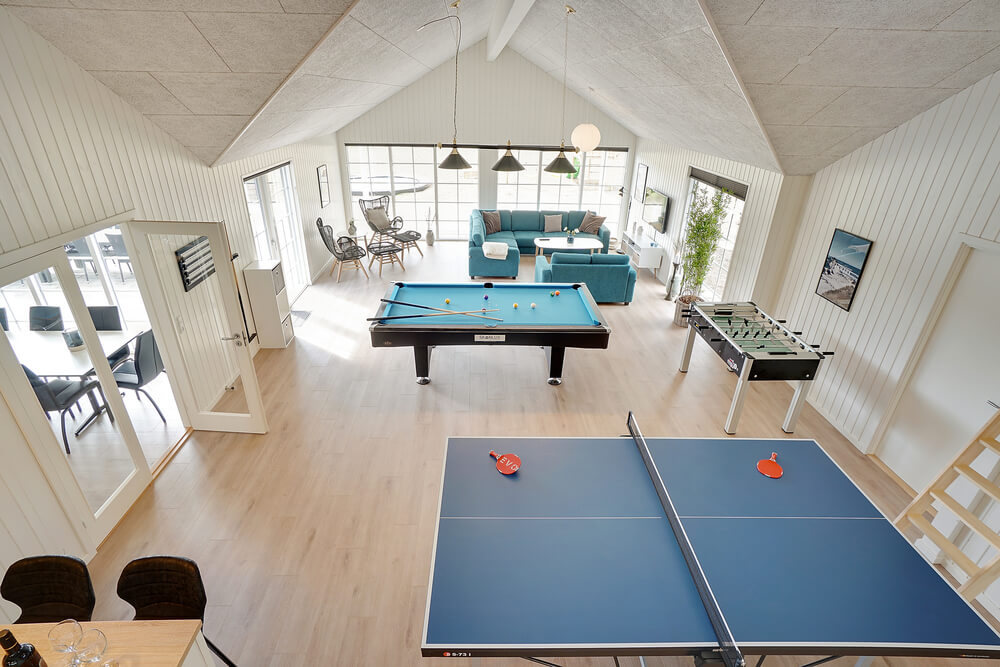 Das Luxusferienhaus 442 für 26 Personen hat einen großen Aktivitätsraum mit u. a. Billard und Darts