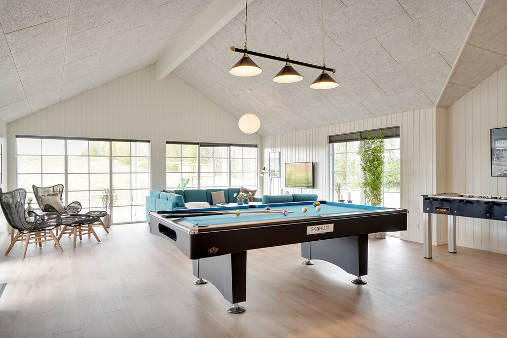 Neben den vielen schönen Stunden, die man im Poolbereich des Hauses verbringen kann, bietet das Luxusferienhaus 442 auch Spielevergnügen bei Billard/Tischtennis und Darts