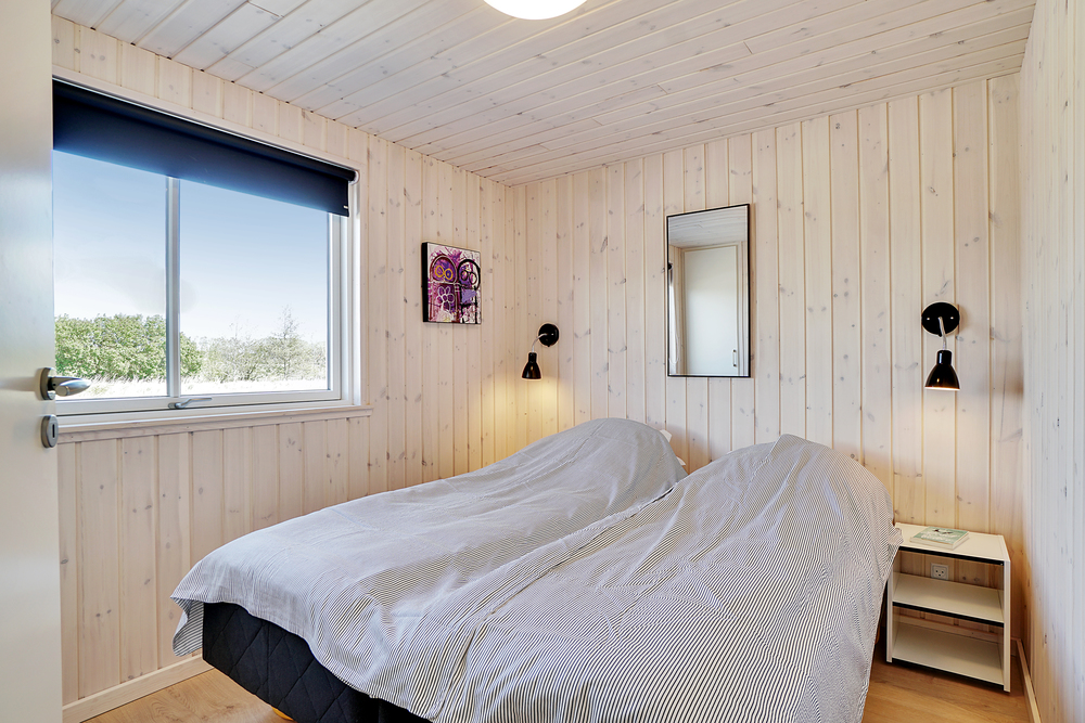 Eines der 9 Schlafzimmer im Luxusferienhaus Nr. 448