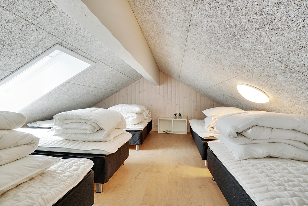Der große ausgebaute Dachboden im Luxusferienhaus Nr. 448 für 24 Personen