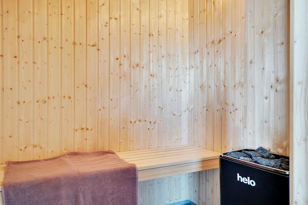 Genießen Sie die heiße Sauna im Luxusferienhaus Nr. 448 für 24 Personen