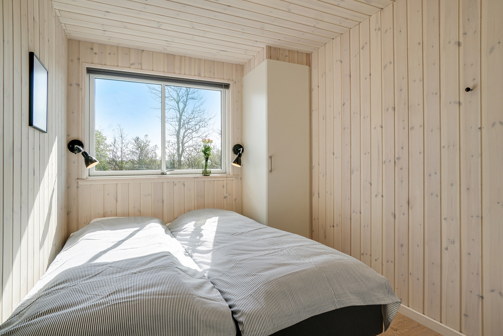 Eines der 10 Schlafzimmer im Luxusferienhaus Nr. 441
