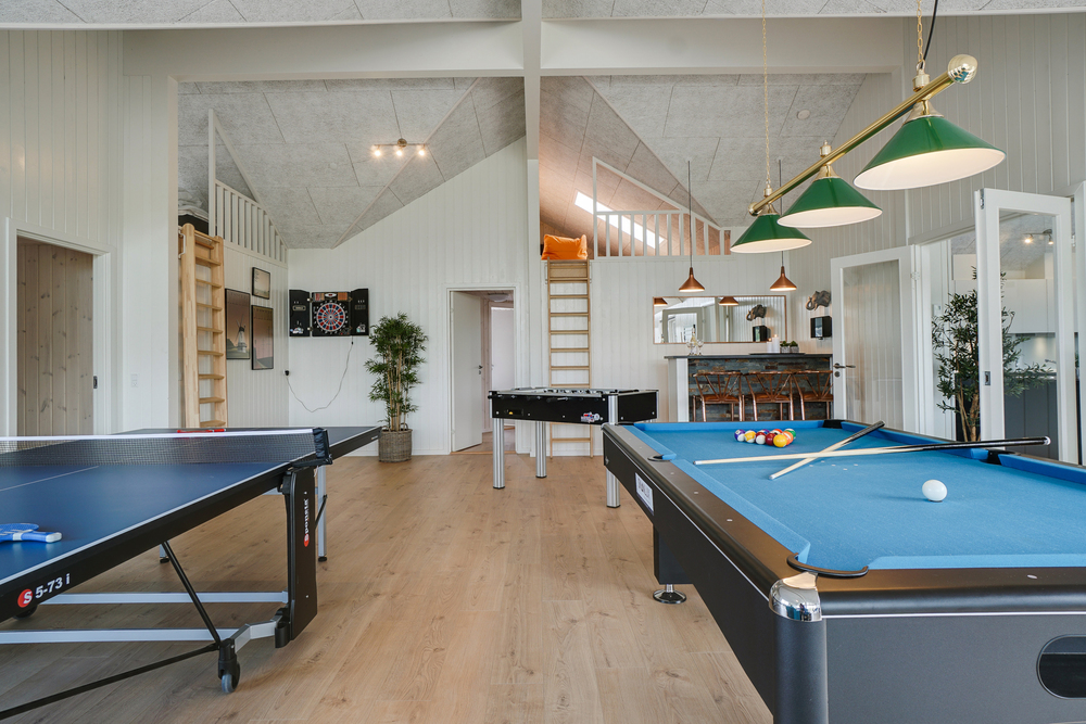 Aktivitätsraum im Luxusferienhaus Nr. 441 mit 10 Schlafzimmern und Platz für 26 Gäste.