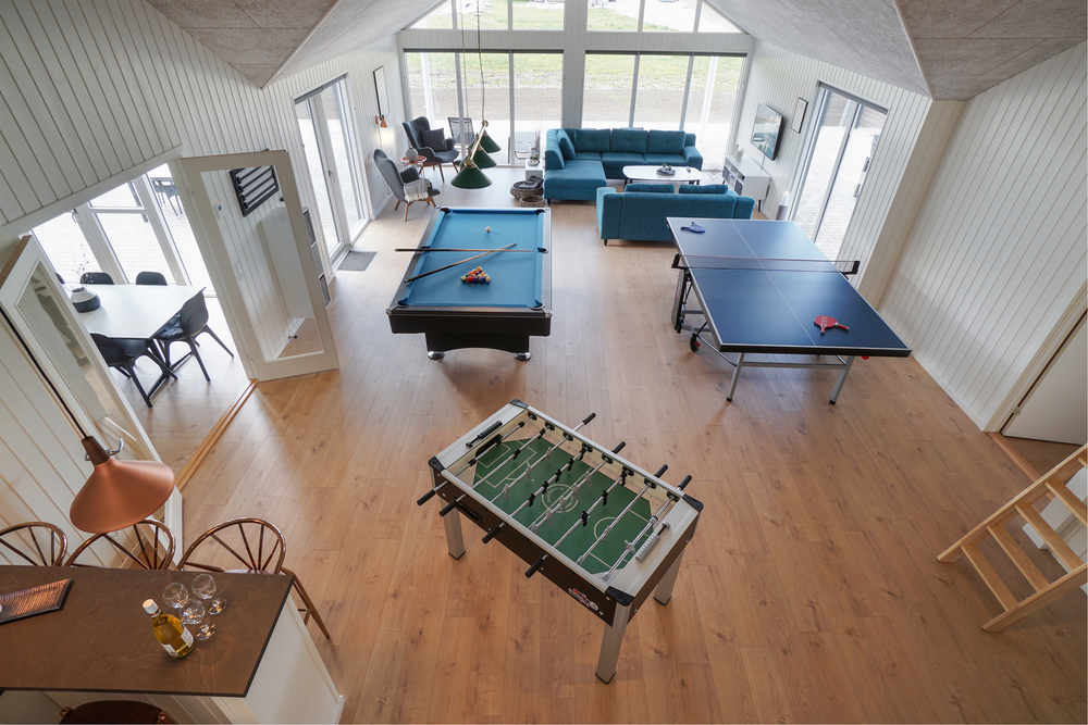 Neben den vielen schönen Stunden, die man im Poolbereich des Hauses verbringen kann, bietet das Luxusferienhaus 441 auch Spielevergnügen bei Billard/Tischtennis und Darts