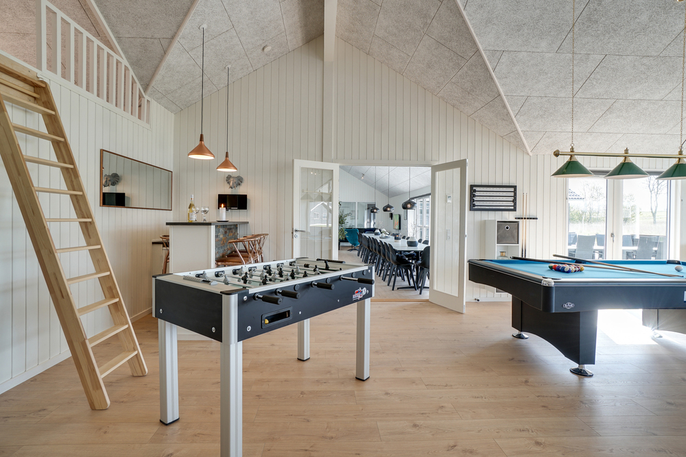 Das Luxusferienhaus 441 für 26 Personen hat einen großen Aktivitätsraum mit u. a. Billard und Darts