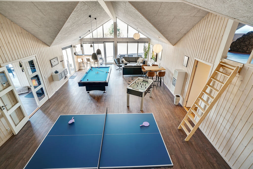 Neben den vielen schönen Stunden, die man im Poolbereich des Hauses verbringen kann, bietet das Luxusferienhaus 446 auch Spielevergnügen bei Billard/Tischtennis und Darts