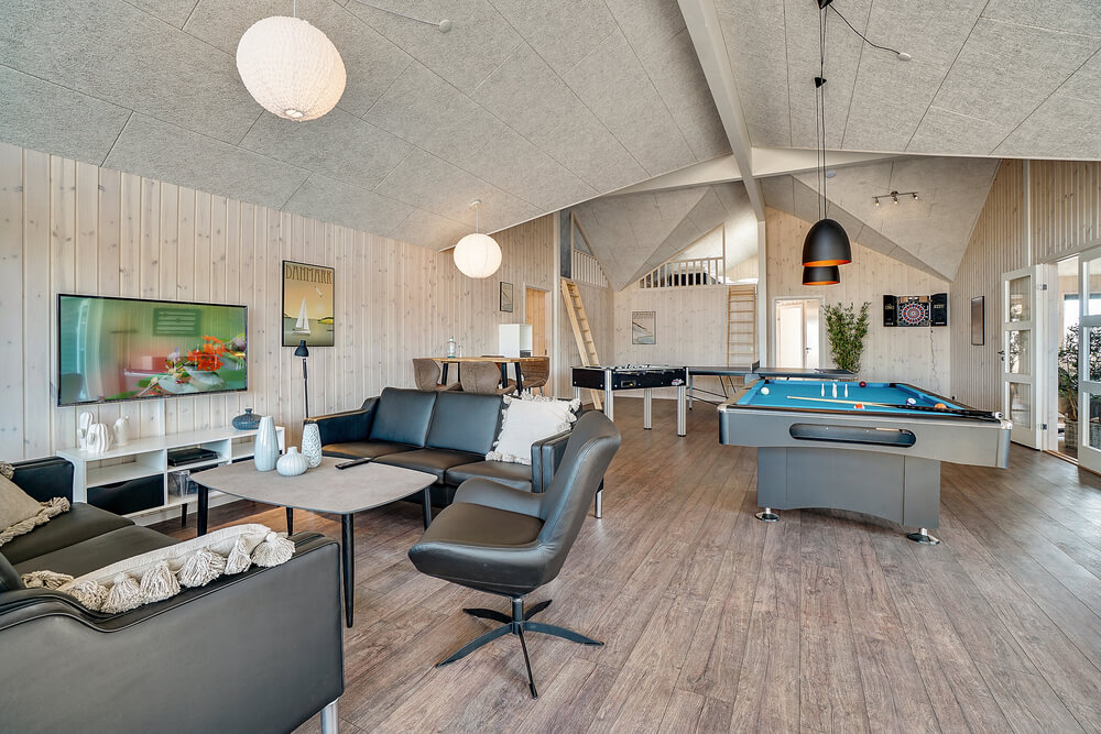 Aktivitätsraum im Luxusferienhaus Nr. 446 mit 12 Schlafzimmern und Platz für 30 Gäste.