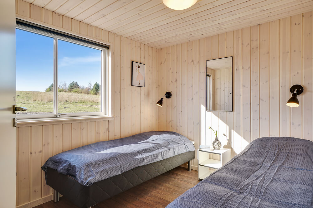 Eines der 12 Schlafzimmer im Luxusferienhaus Nr. 450