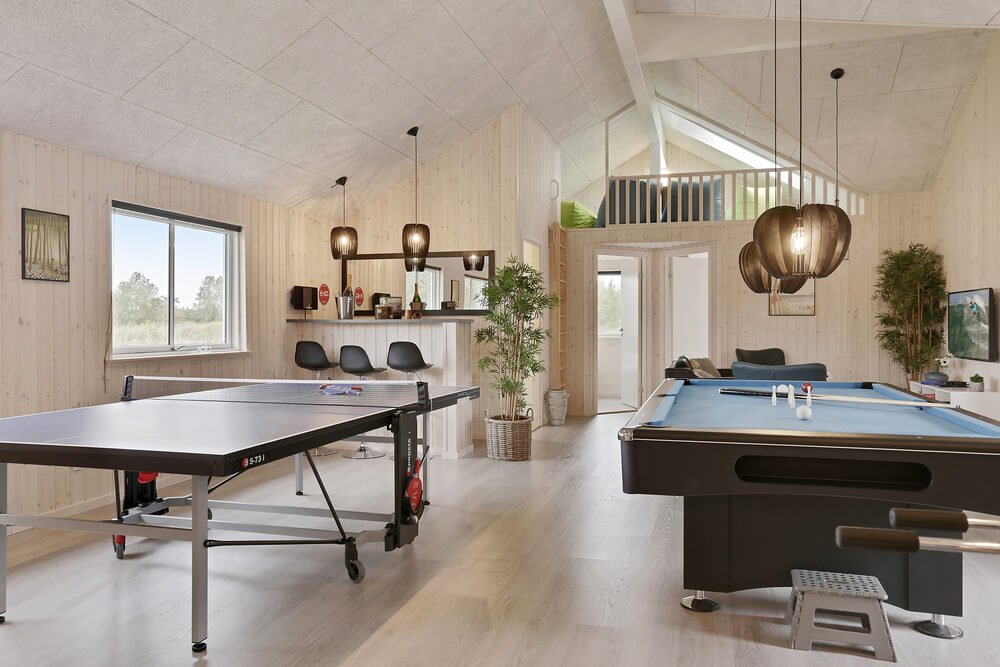 Neben den vielen schönen Stunden, die man im Poolbereich des Hauses verbringen kann, bietet das Luxusferienhaus 432 auch Spielevergnügen bei Billard/Tischtennis und Darts