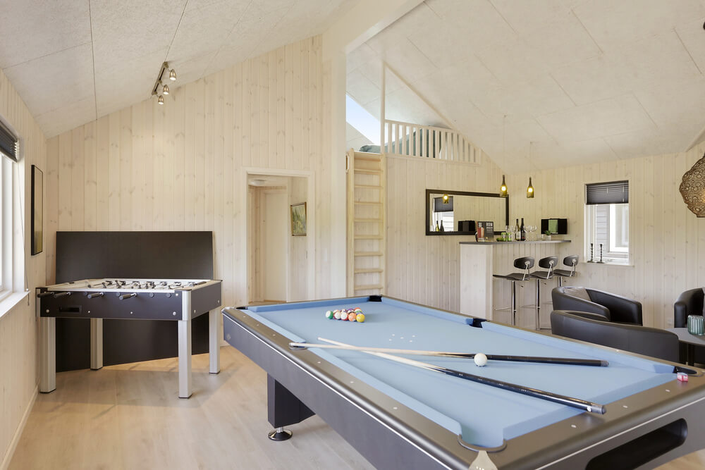 Neben den vielen schönen Stunden, die man im Poolbereich des Hauses verbringen kann, bietet das Luxusferienhaus 433 auch Spielevergnügen bei Billard/Tischtennis und Darts