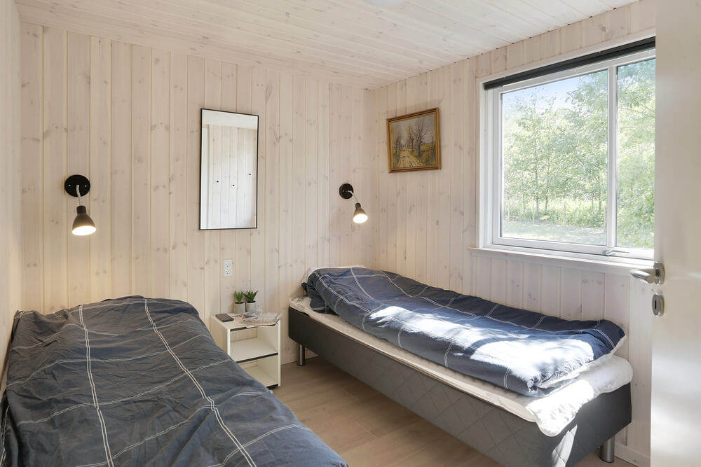 Eines der 6 Schlafzimmer im Luxusferienhaus Nr. 433