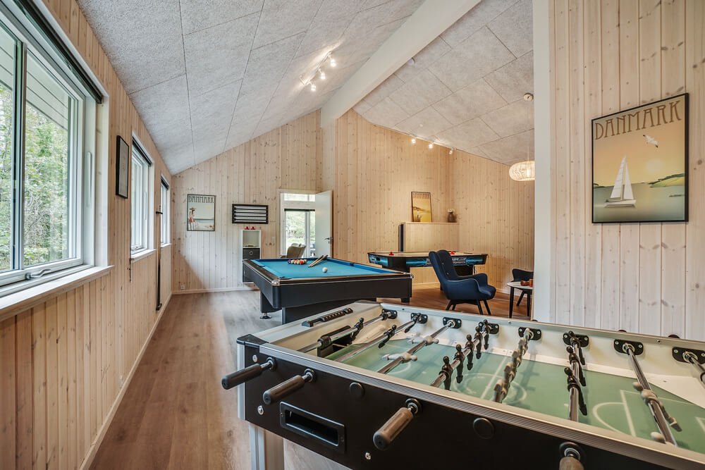 Neben den vielen schönen Stunden, die man im Poolbereich des Hauses verbringen kann, bietet das Luxusferienhaus 434 auch Spielevergnügen bei Billard/Tischtennis und Darts