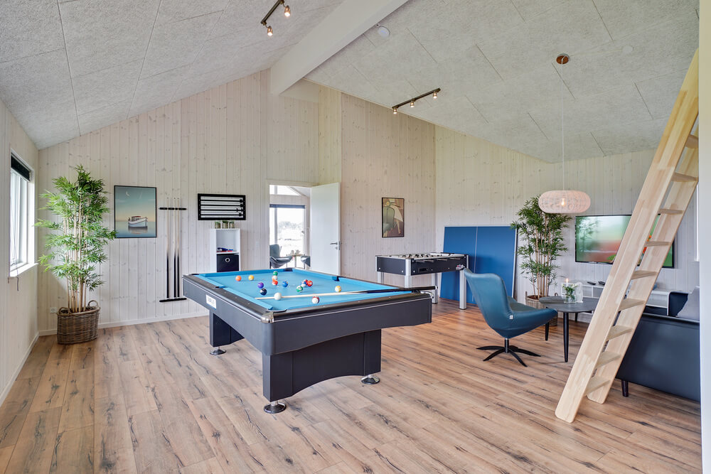 Neben den vielen schönen Stunden, die man im Poolbereich des Hauses verbringen kann, bietet das Luxusferienhaus 437 auch Spielevergnügen bei Billard/Tischtennis und Darts