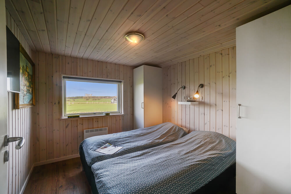Eines der 4 Schlafzimmer im Luxusferienhaus Nr. 443