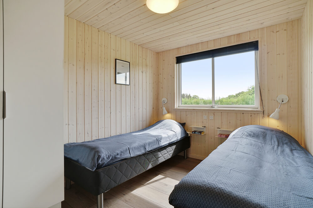 Eines der 8 Schlafzimmer im Luxusferienhaus Nr. 453